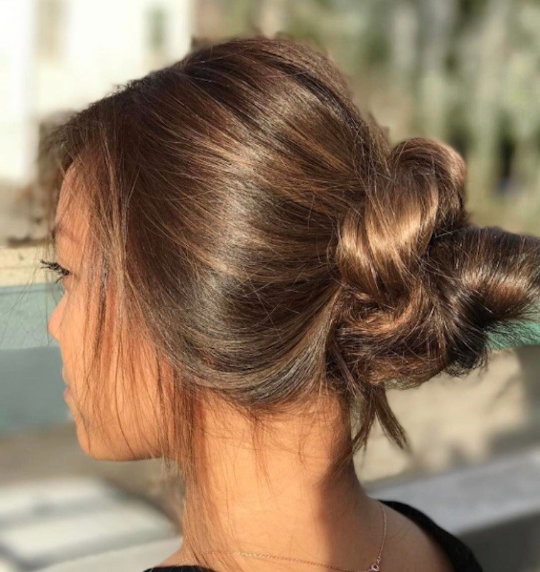 The Cord Knot Bun Is About to Be Your Go-To Summer Hairstyle | Glamour