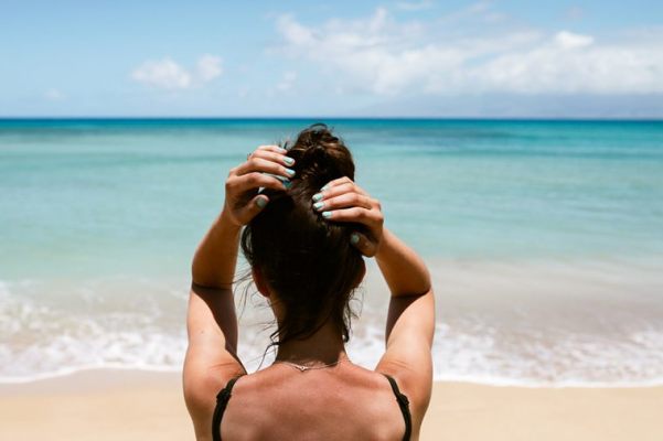 3 Genius (and Super-Easy) Ways to Protect Your Hair This Summer