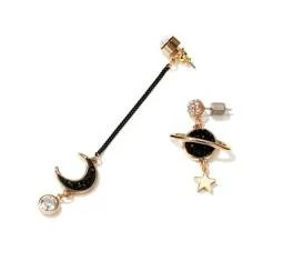 Asymmetrical earrings are a wabi-sabi jewelry trend we love | Well