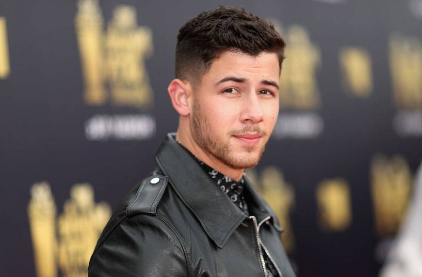 A morning stretch routine is Nick Jonas' fave self-care ...