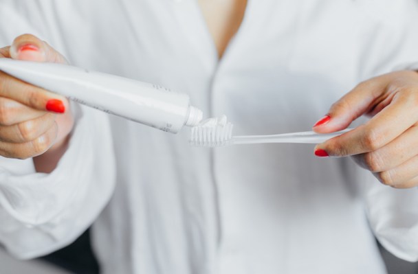 This Is the Biggest Mistake You're Making When You Brush Your Teeth in the Shower