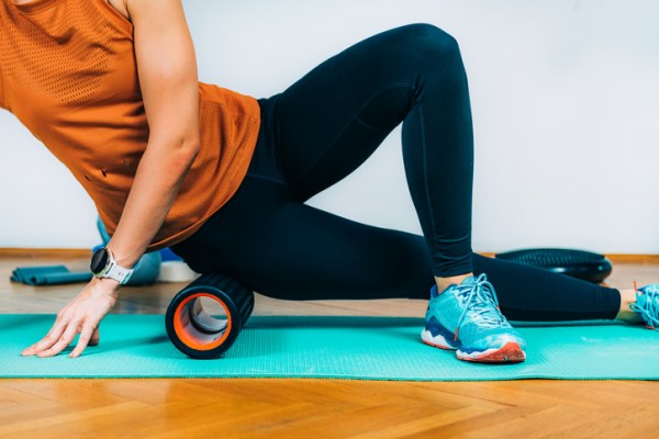 Should You Foam Roll Your IT Band? Here’s What a PT Wants You To Know