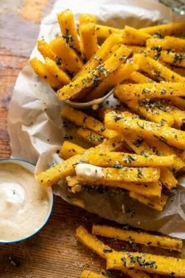 https://www.wellandgood.com/wp-content/uploads/2022/06/Garlic-Parmesan-Herb-Butter-Polenta-Fries-with-Lemon-Aioli-6-700x1050-1-267x400_falsexfalse_true_70.webp