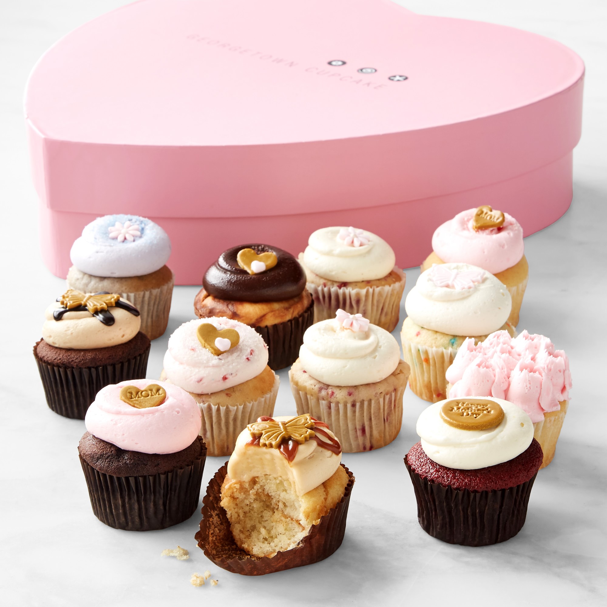 https://www.wellandgood.com/wp-content/uploads/2023/04/georgetown-cupcake-mothers-day-cupcakes.jpeg