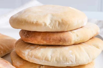 https://www.wellandgood.com/wp-content/uploads/2023/06/Lebanese-pita-bread_418x276_true_70.webp