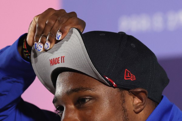 Noah Lyles of the United States shows his "Made It" hat during a Team USA Track & Field press conference on day three of the Olympic Games Paris 2024 at the Main Press Centre on July 29, 2024 in Paris, France. 