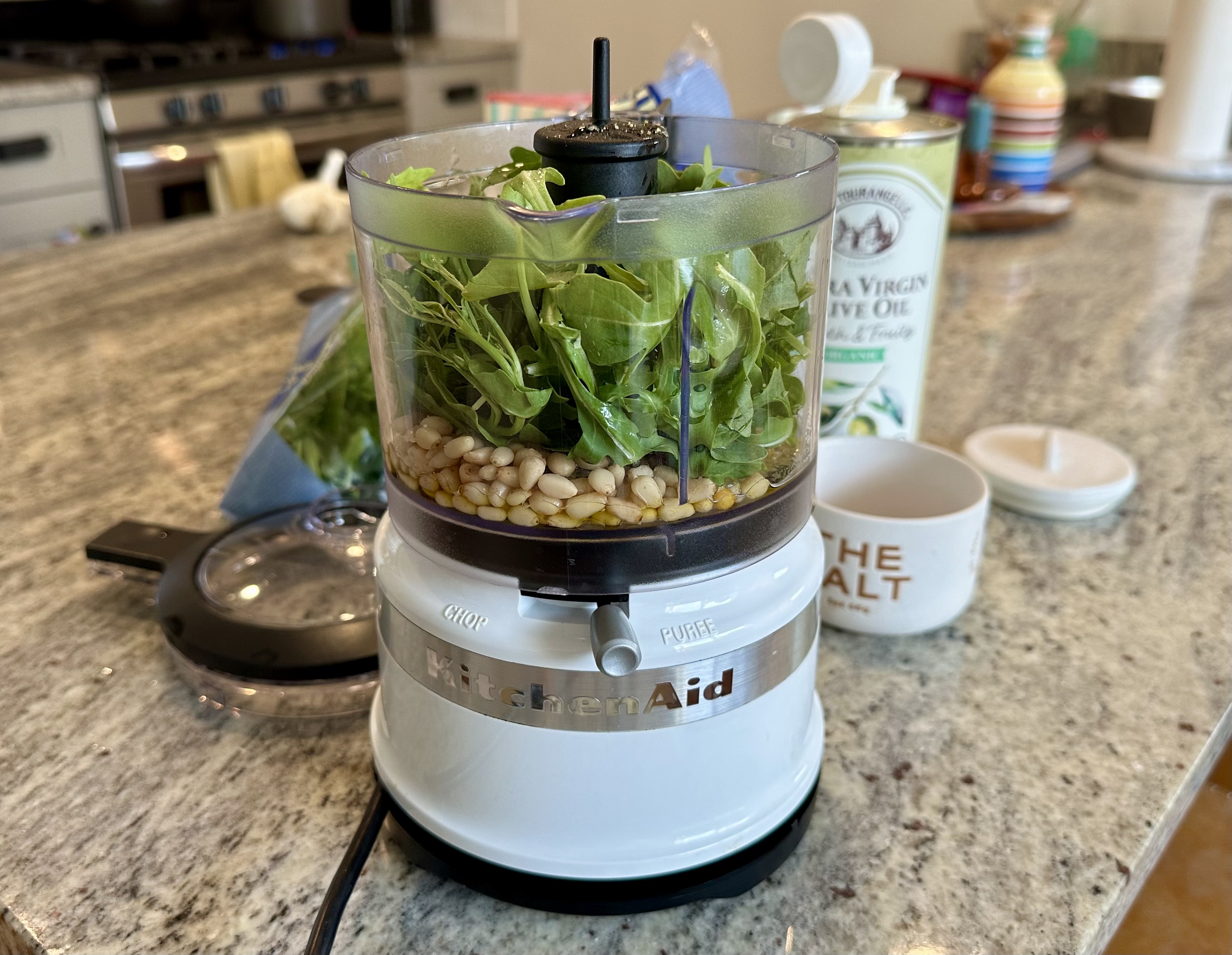 making pesto in the kitchenaid food chopper