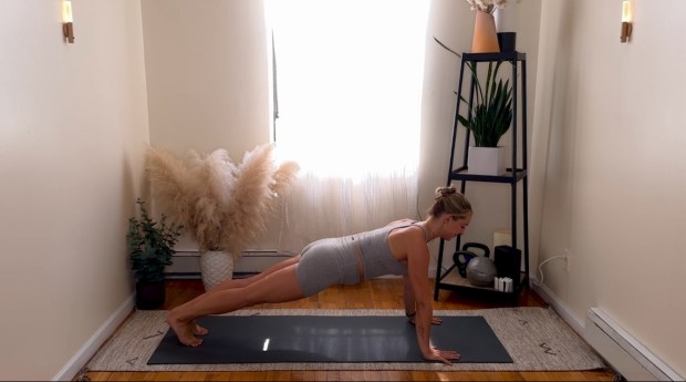 Personal trainer and Pilates instructor demonstrating push-up