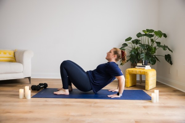 Personal trainer demonstrating triceps dip