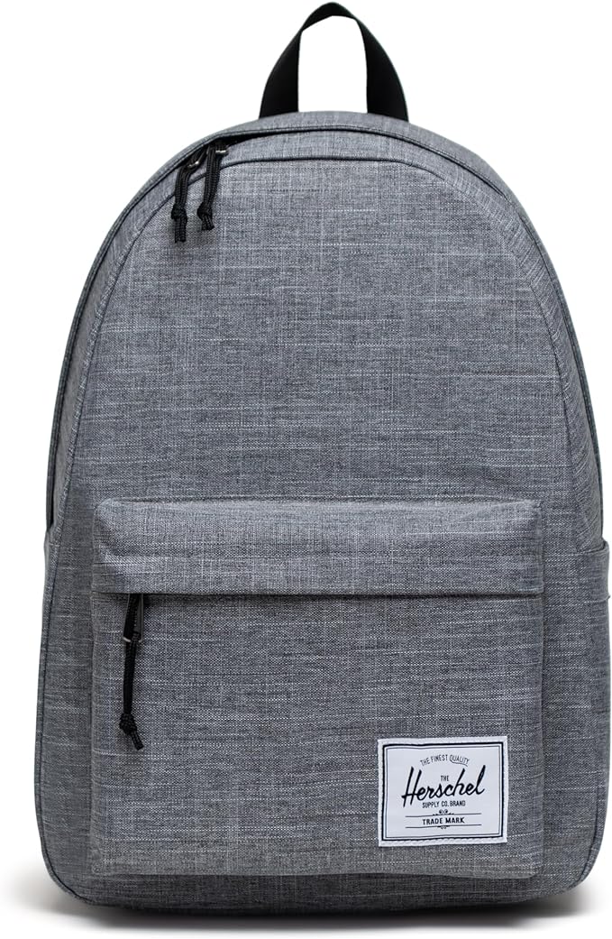 a gray herschel classic backpack for college