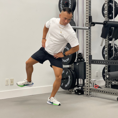 Physical therapist demonstrating hip airplane