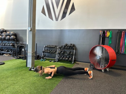 Personal trainer demonstrating push-up