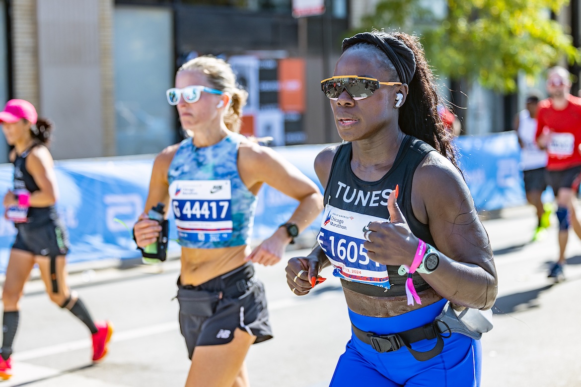 Photo of Peloton instructor Tunde Oyeneyin running the 2024 Chicago Marathon