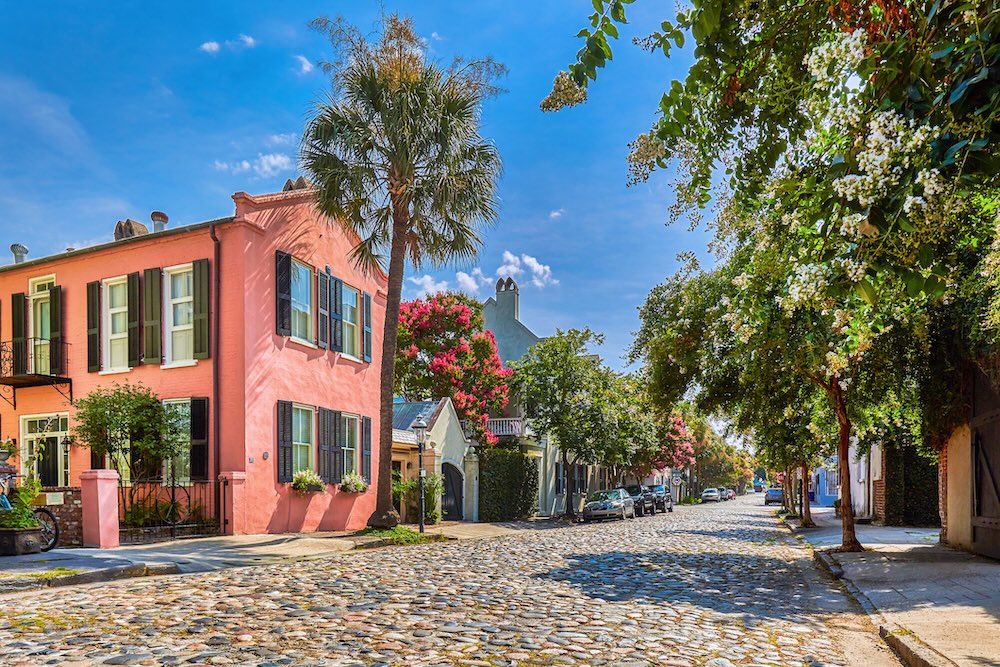 Cobblestoned Chalmers Street and historic buildings in Charleston, South Carolina,USA