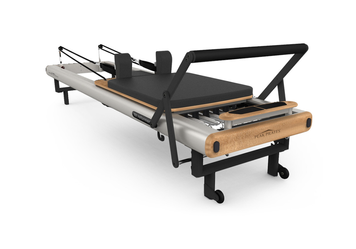 Peak Pilates Fit Reformer on white background